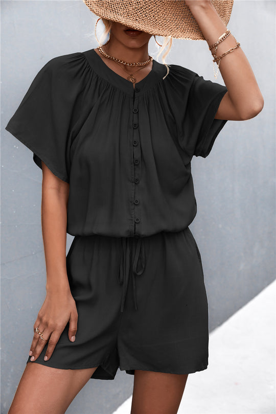 Damen Jumpsuit mit elastischem Bund und knopfverzierter Front EB