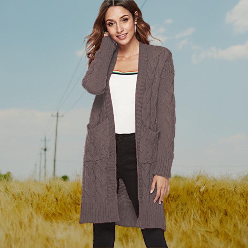 Damen Strickmantel mit voluminösen Ärmeln und praktischen Taschen EB