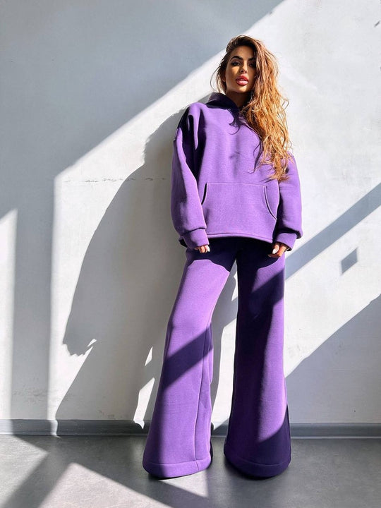 Damen Scuba-Fleece Lounge-Set mit Oversize-Kapuzenpullover und weiter Flare-Hose Eichborn Berlin