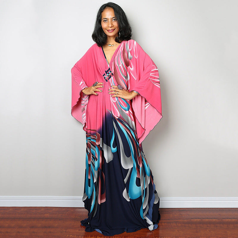Damen Maxikleid mit kunstvollem Pfauenmuster und seitlichen Schlitzen Heidi Mode