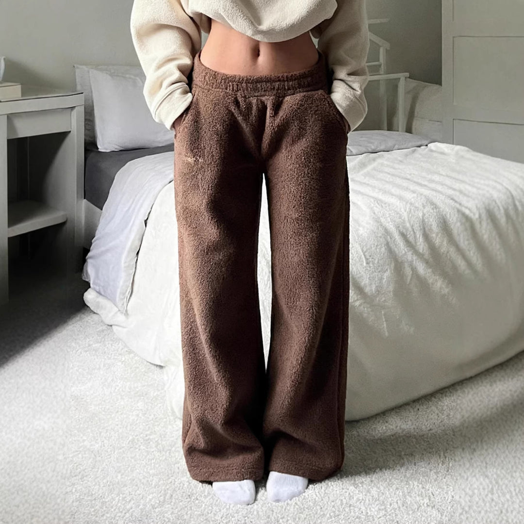 Damen Flauschige Jogginghose mit elastischem Bund und Seitennahttaschen EB