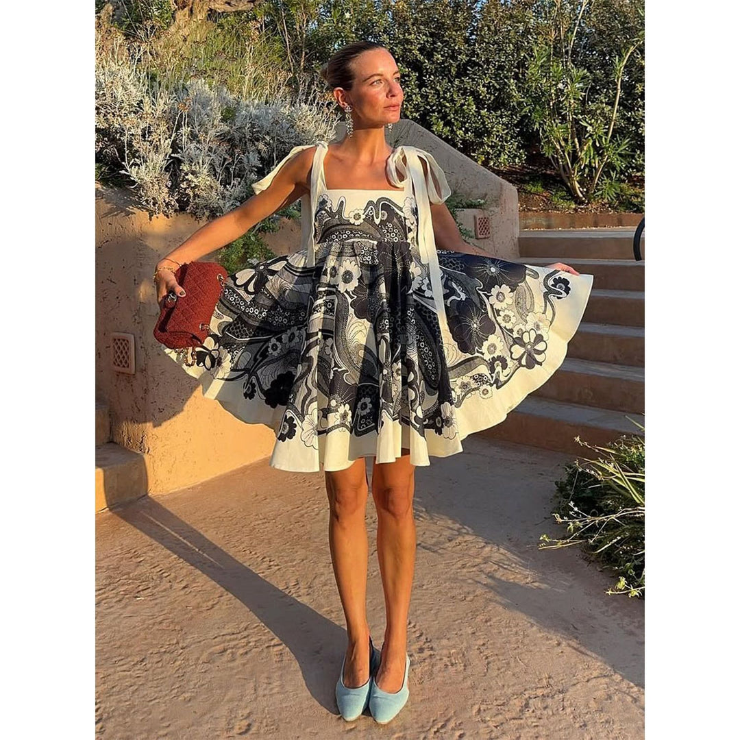 Damen Sommerliches Minikleid mit verspieltem Mustermix und fließendem Schnitt EB