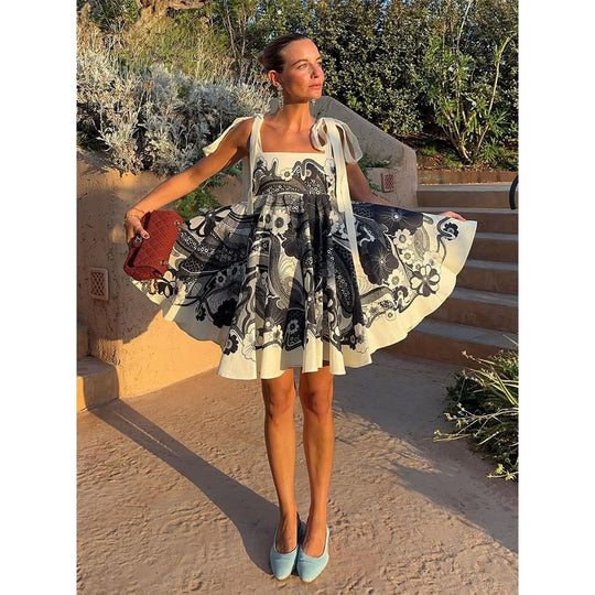 Damen Sommerliches Minikleid mit verspieltem Mustermix und fließendem Schnitt EB