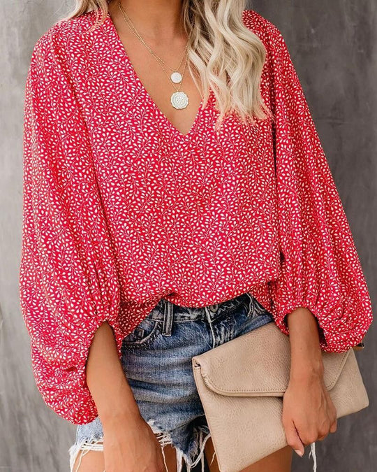 Damen Bluse mit weiten Ärmeln und floralem Muster EB