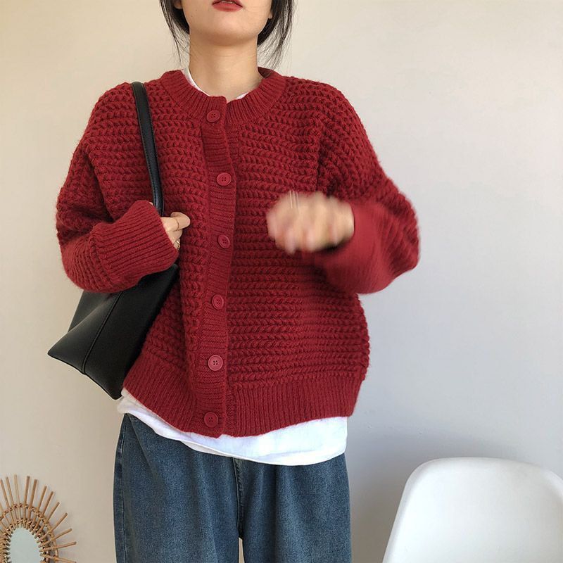 Damen Grobstrickjacke mit Knopfdetails und oversized Schnitt EB