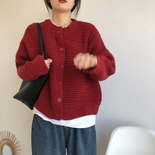 Damen Grobstrickjacke mit Knopfdetails und oversized Schnitt EB