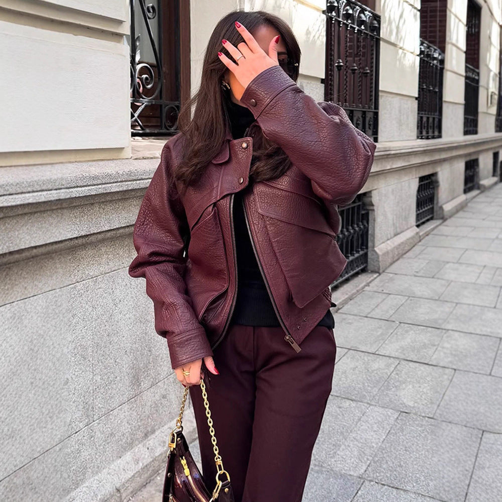 Damen Kunstlederjacke mit modischem Schnitt und praktischen Taschen EB