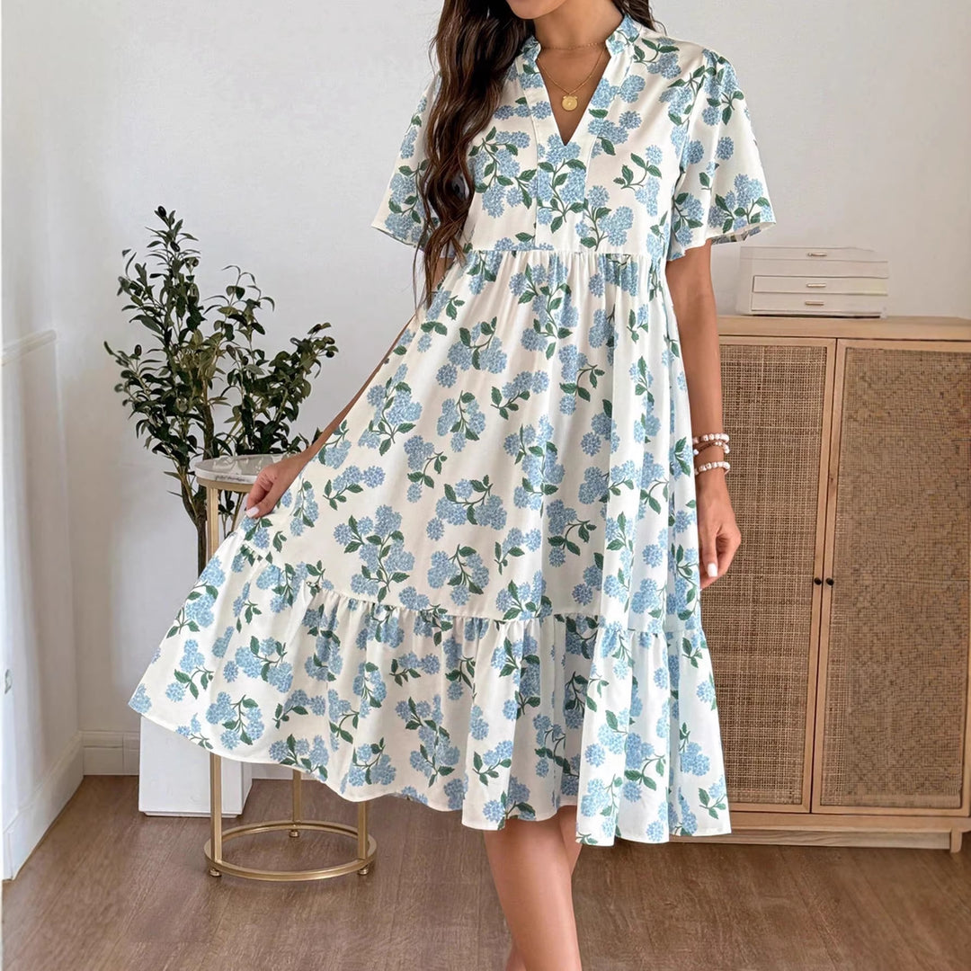 Damen Midikleid mit frischem Blumenmuster und voluminösem Rock EB
