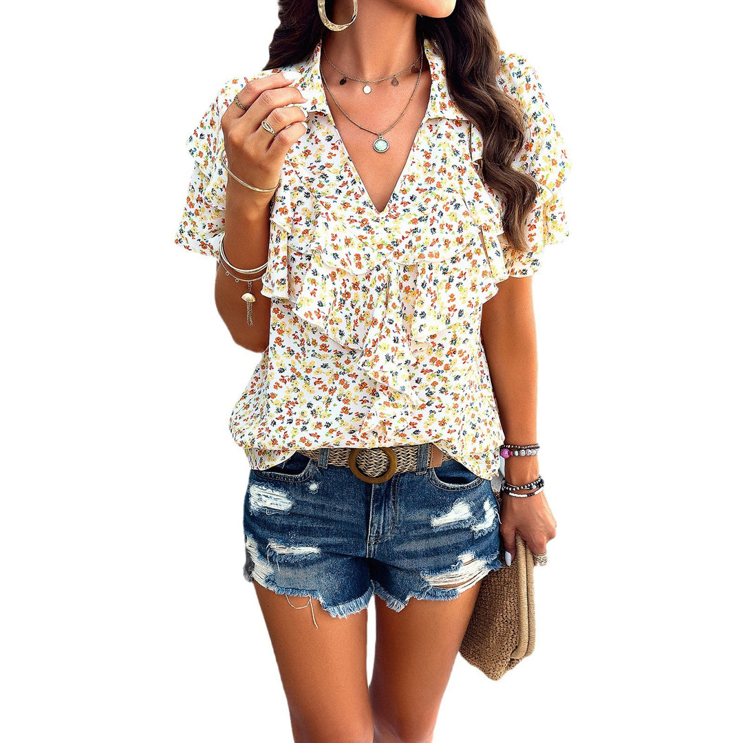 Damen Bluse mit voluminösen Rüschen und floralen Mustern EB
