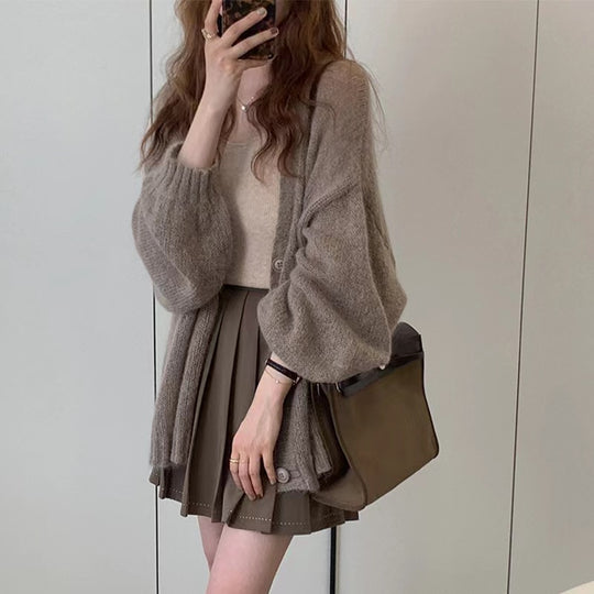 Damen Modische Strickjacke mit weiten Ärmeln und eleganten Details EB