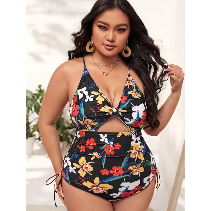 Damen Einteiler Badeanzug mit modischem Cut-Out und buntem geometrischem Design EB
