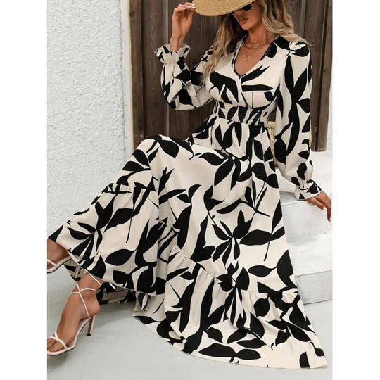 Damen Maxikleid mit floralem Muster und voluminösem Saum EB