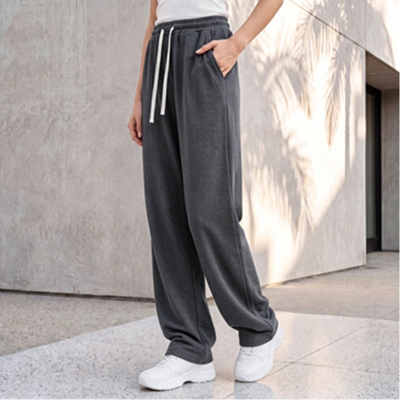 Damen nan weite Loungepalazzo-Hose mit hohem Komfortbund, Kordelzug, seitlichen Eingrifftaschen und dekorativer Seitennaht EB