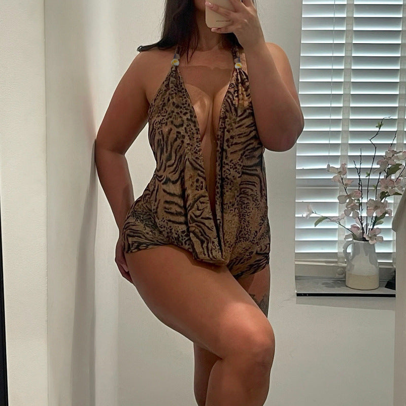 Damen eleganter Einteiler mit tiefem V-Ausschnitt und verspieltem Animal-Print EB