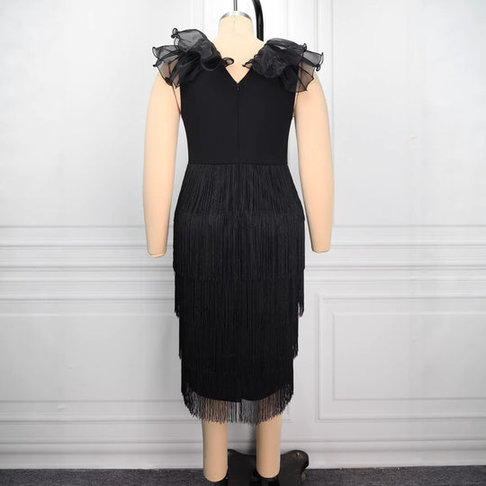 Damen Abendkleid mit voluminösen Rüschendetails und schickem Fransen EB