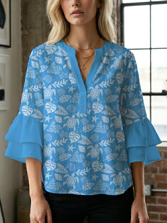 Damen Bluse mit voluminösen Rüschenärmeln und modernem Motiv EB