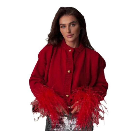 Damen Schicke Strickjacke mit auffälligen Federärmeln EB