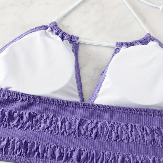 Damen Bikini-Set mit floralem Oberteil und hochglänzenden Shorts EB
