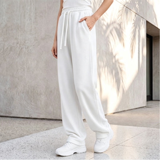 Damen nan weite Loungepalazzo-Hose mit hohem Komfortbund, Kordelzug, seitlichen Eingrifftaschen und dekorativer Seitennaht EB