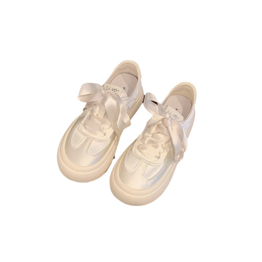 Damen Sneaker mit dekorativen Schleifen und hochwertiger Oberflächenstruktur EB