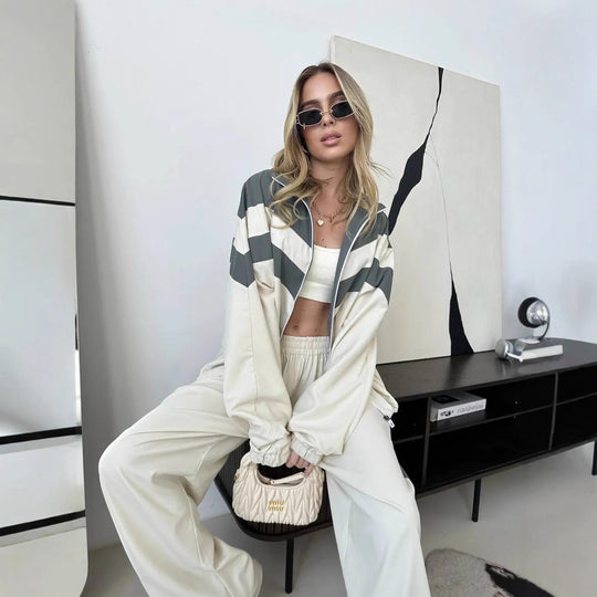 Damen Oversized Windbreaker-Set mit Reißverschlussjacke und elastischer Bundhose Eichborn Berlin