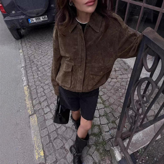 Damen Kunstlederjacke mit praktischen Taschen und elastischem Bund EB