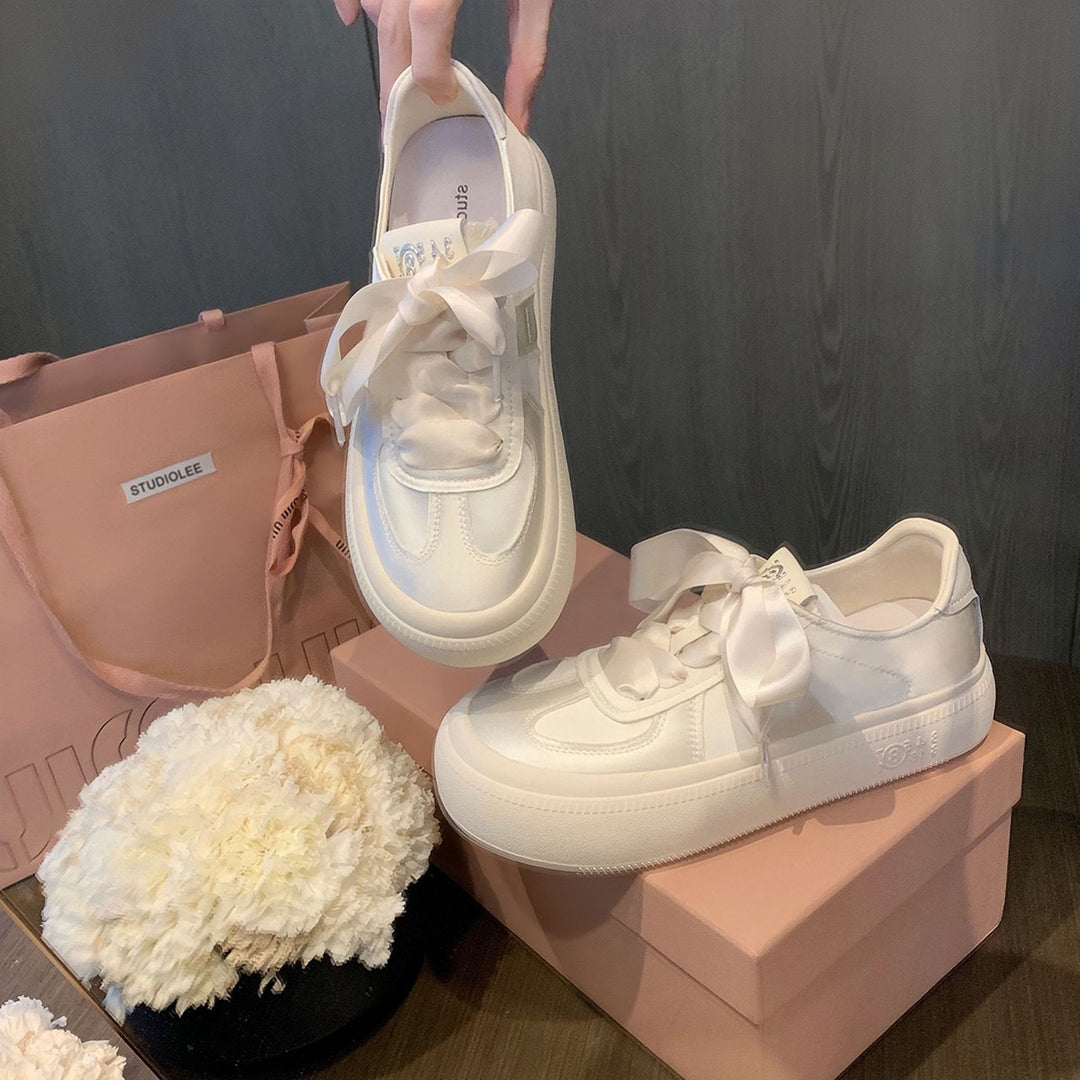 Damen Sneaker mit dekorativen Schleifen und hochwertiger Oberflächenstruktur EB