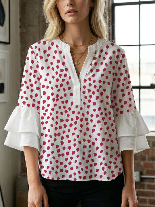 Damen Bluse mit voluminösen Flügelärmel und intensivem Blattmuster EB