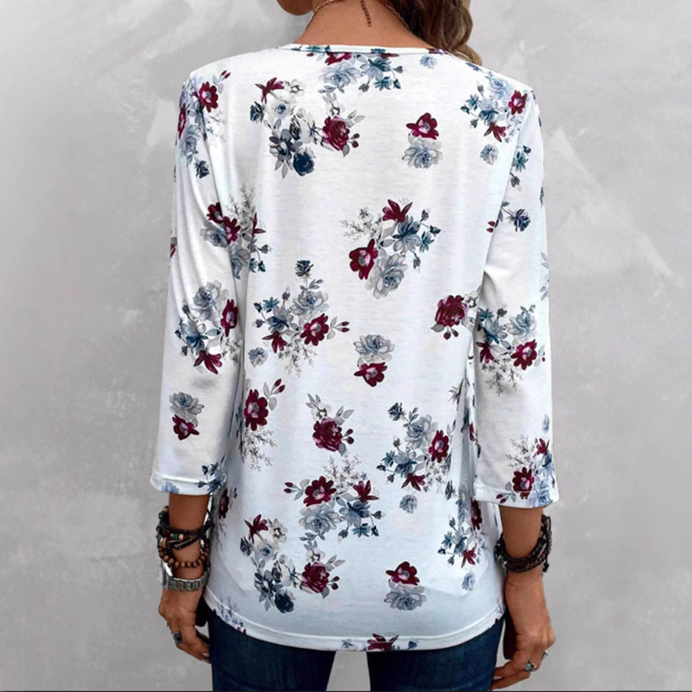 Damen Blusenshirt mit floralen Akzenten und knöpfbarem Ausschnitt Heidi-Mode