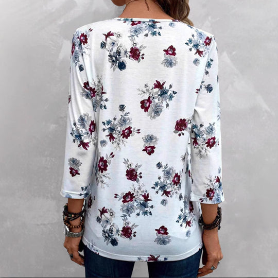 Damen Blusenshirt mit floralen Akzenten und knöpfbarem Ausschnitt Heidi-Mode