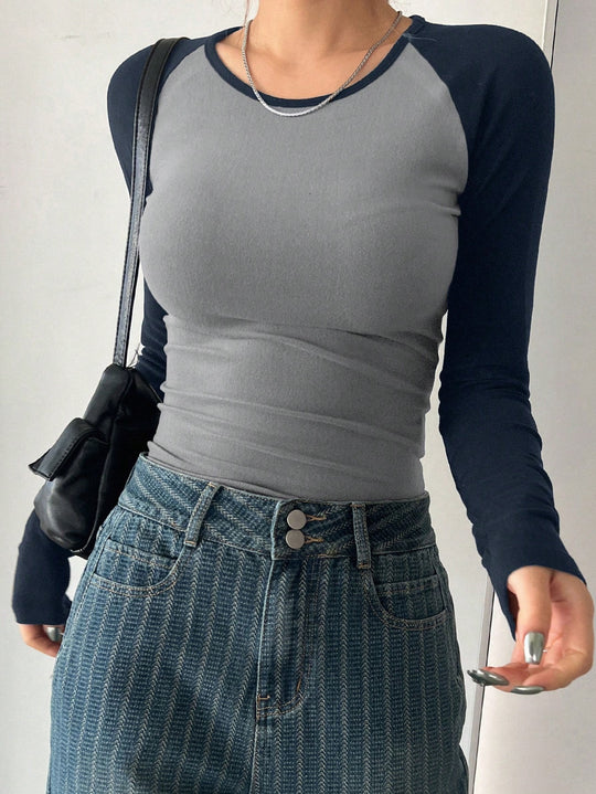 Damen Langarmshirt mit Kontrastärmeln und figurbetontem Schnitt EB