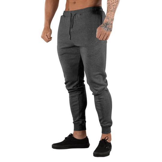 Herren nan schmal geschnittene Fleece-Freizeithose mit Tunnelzug, Eingrifftaschen und Rippbündchen EB