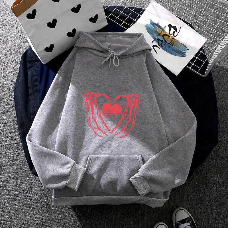 Damen nan stylischer Kapuzenpullover mit Skeletthand Herzmotiv und Kängurutasche EB