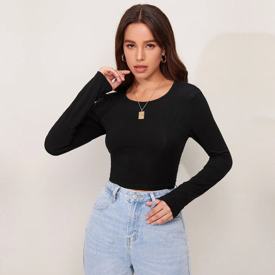Damen figurbetontes Cropped-Longsleeve mit Sculpting-Passform und Rundhalsausschnitt Eichborn Berlin