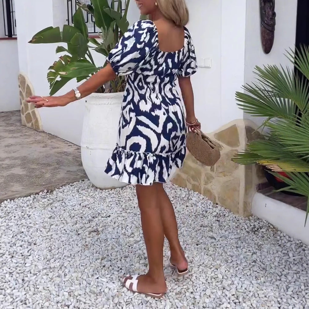 Damen Sommerliches Minikleid mit voluminösen Puffärmeln und trendigem Rüschensaum Heidi-Mode