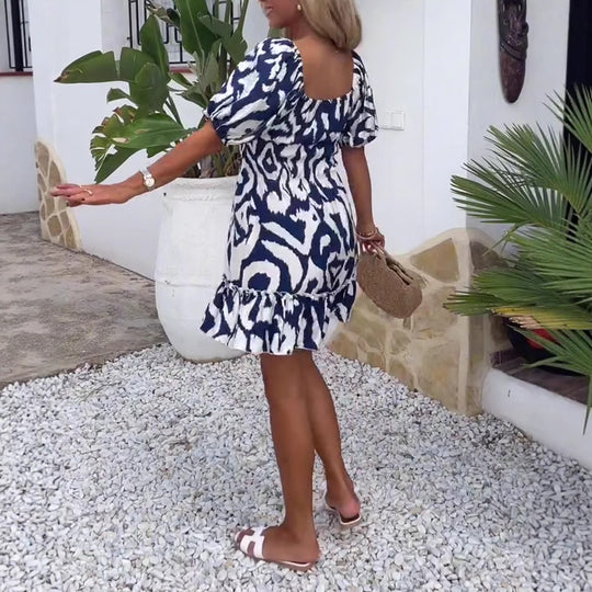 Damen Sommerliches Minikleid mit voluminösen Puffärmeln und trendigem Rüschensaum Heidi-Mode