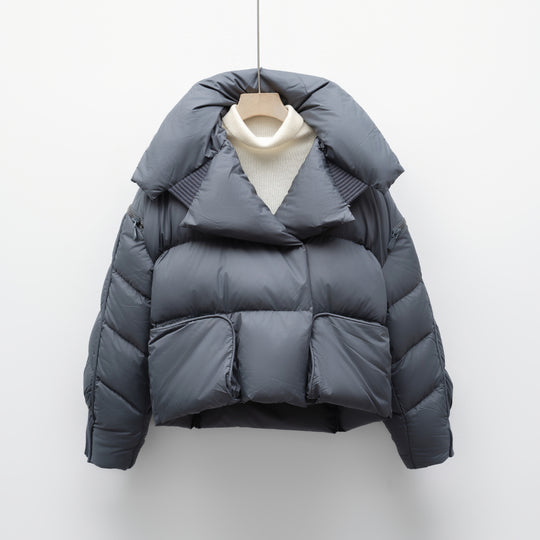 Damen modische verkürzte Steppjacke mit hoch geschlossenem Kragen und praktischen Taschen EB