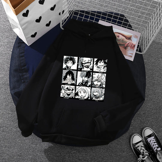Unisex nan Kapuzenpullover mit quadratischer Manga-Charakter-Collage, leicht oversizeder Schnitt und Kängurutasche EB