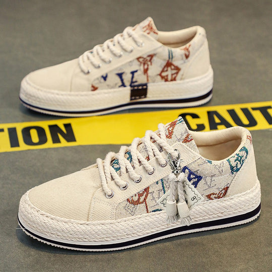 Damen bestickte Canvas‑Sneaker mit Quastenanhänger und geflochtener Plateausohle EB