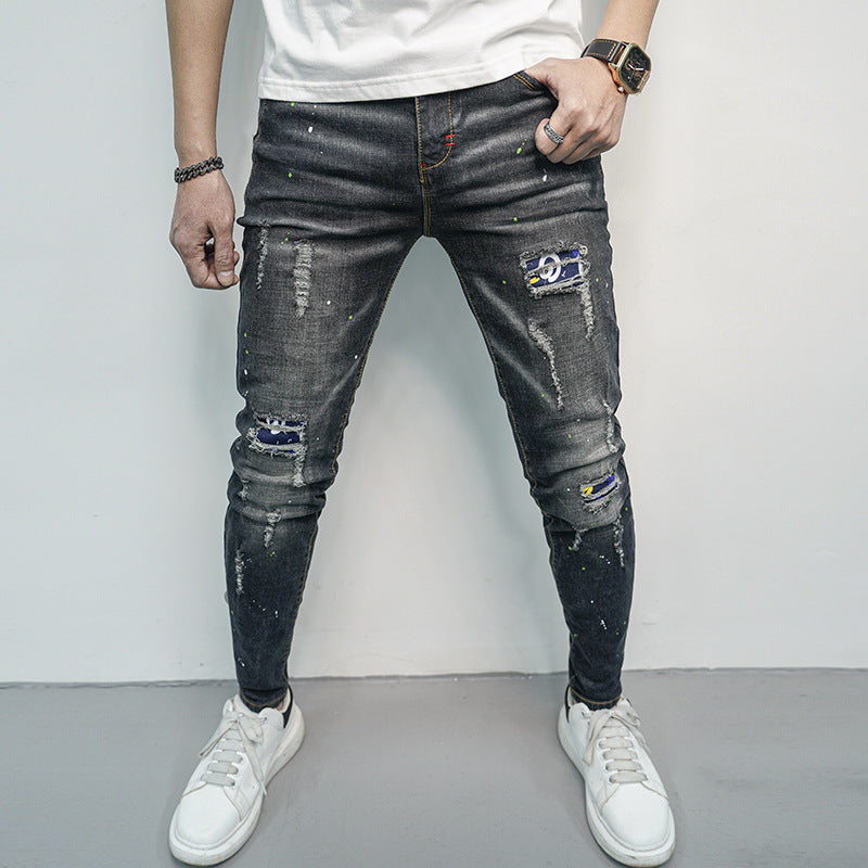 Herren Skinny Fit Jeans im kreativen Rissdesign und bunten Farbsklecks EB