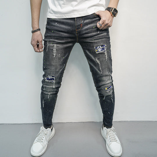 Herren Skinny Fit Jeans im kreativen Rissdesign und bunten Farbsklecks EB