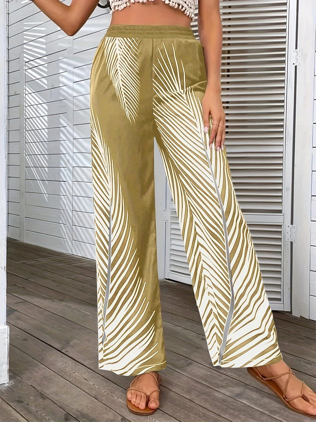 Damen Elegante und luftige Palazzohose mit Palmenmuster EB