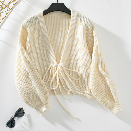 Damen Strickjacke mit voluminösen Ärmeln und dekorativen Bindebändern EB