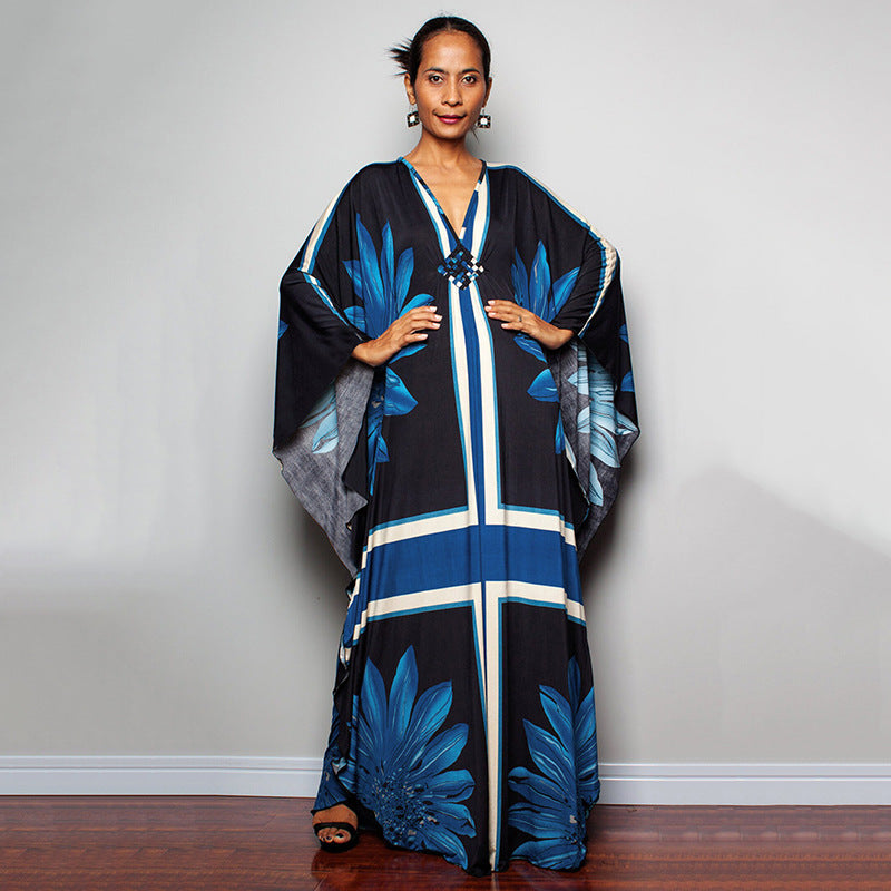 Damen Maxikleid mit kunstvollem Pfauenmuster und seitlichen Schlitzen Heidi Mode