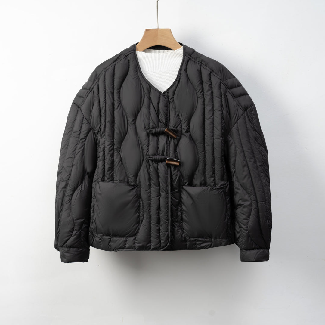 Damen Steppjacke mit praktischem Knopfverschluss und gemütlichen Taschen EB