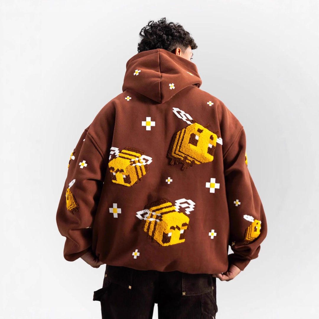 Unisex nan Kapuzenpullover mit eingestricktem Pixel-Bienenmotiv und aufgesetzter Kängurutasche EB