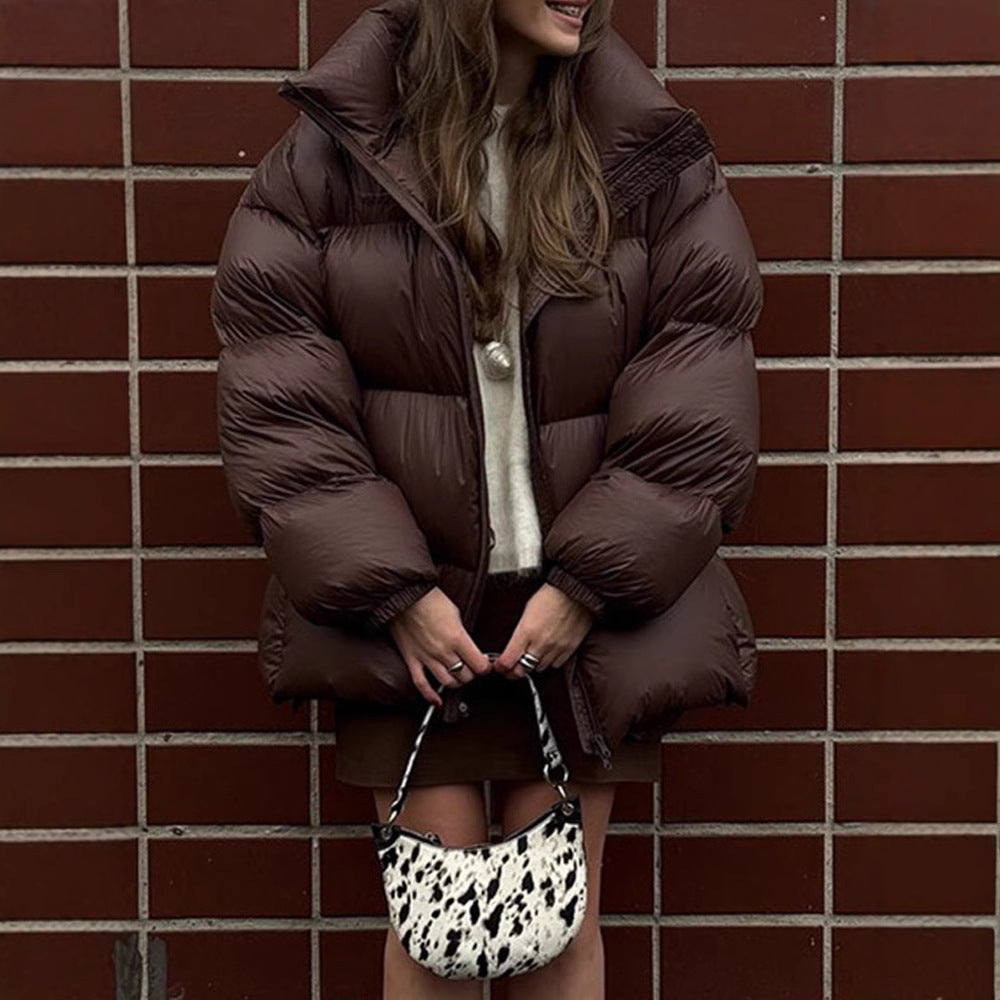 Damen Steppjacke im oversized Schnitt mit hohem Kragen und Taschen EB