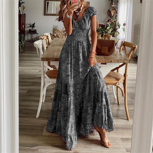 Damen Maxikleid mit tiefem V-Ausschnitt und femininem Muster EB