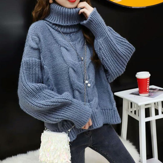 Damen Grobstrickpullover mit hohem Rollkragen und modernem Zopfmuster EB