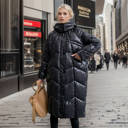 Damen lange isolierte Pufferjacke mit voluminösem Schnitt und praktischen Eingrifftaschen EB